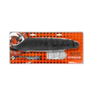 Black OxBalls silicone sheath in retail packaging with orange background