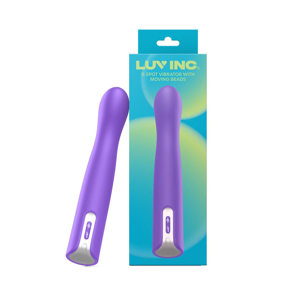 Purple silicone Luv Inc. G-spot vibrator with curved tip and control buttons, shown with branded packaging